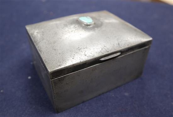 A Liberty & Co. Tudric pewter and turquoise mounted cigarette box, width 11cm